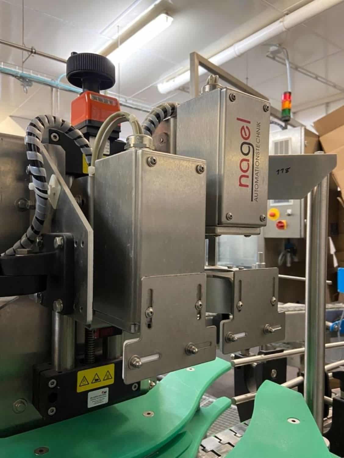 Side view of Nagel, PAC, Juwatec, ICS Returnable Glass Filling line for beer, soft drink