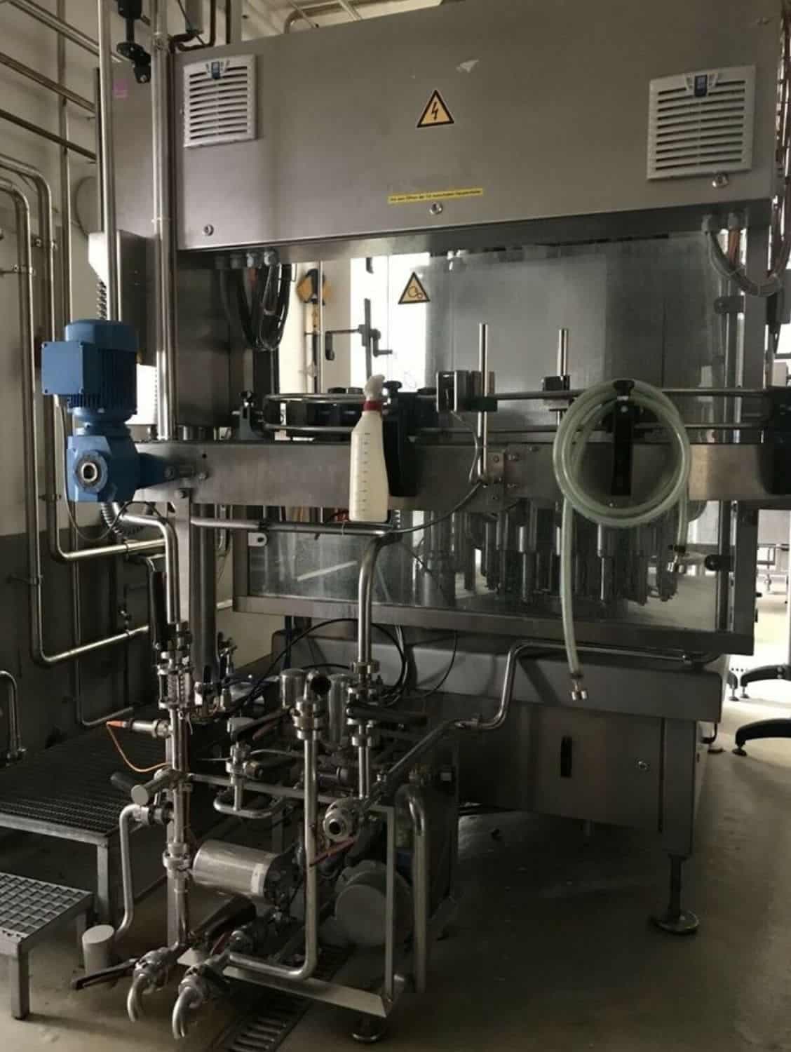 Side view of Nagel, PAC, Juwatec, ICS Returnable Glass Filling line for beer, soft drink