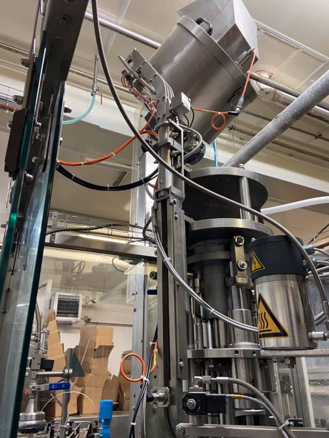 Side view of Nagel, PAC, Juwatec, ICS Returnable Glass Filling line for beer, soft drink