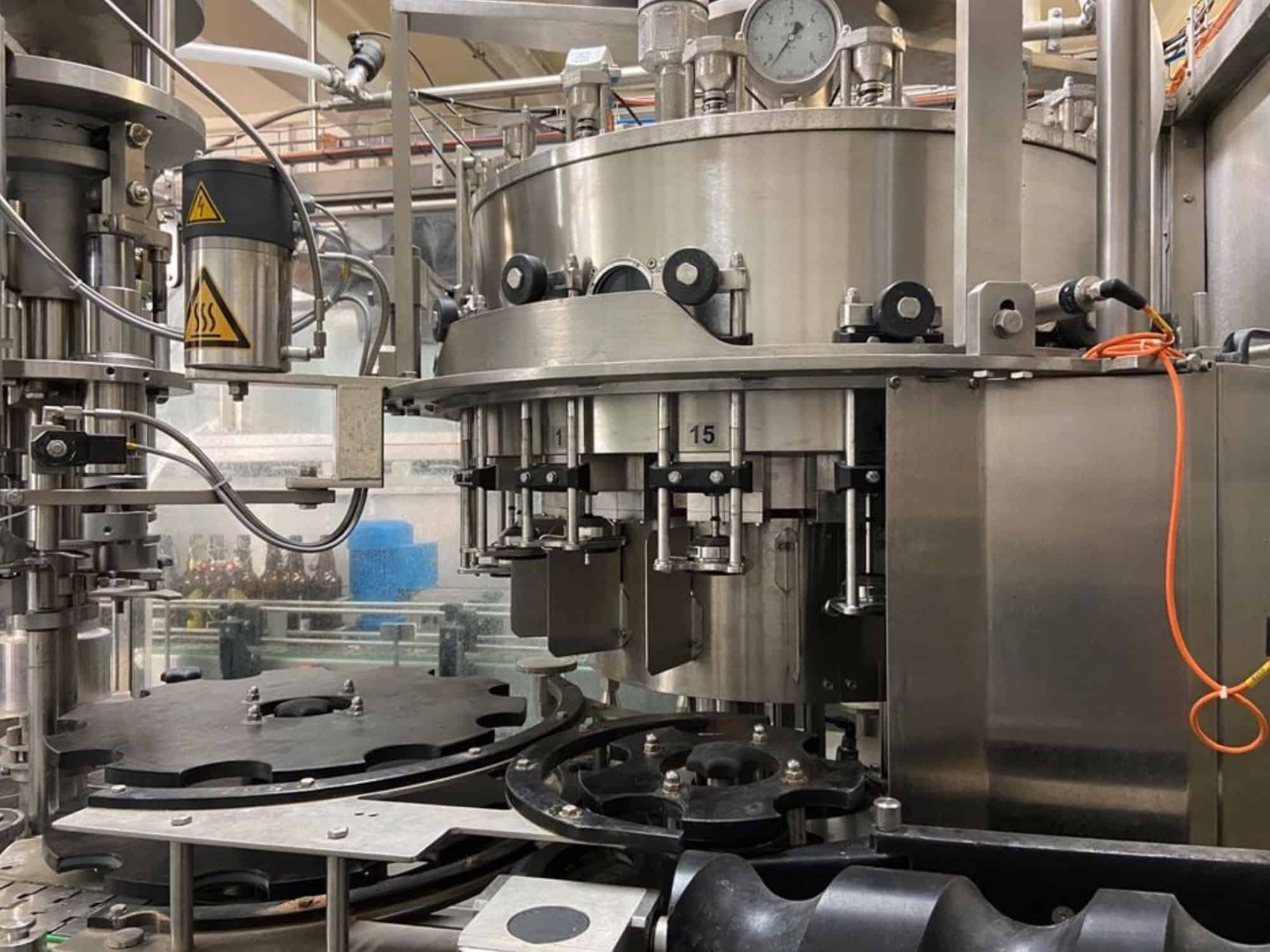 Side view of Nagel, PAC, Juwatec, ICS Returnable Glass Filling line for beer, soft drink