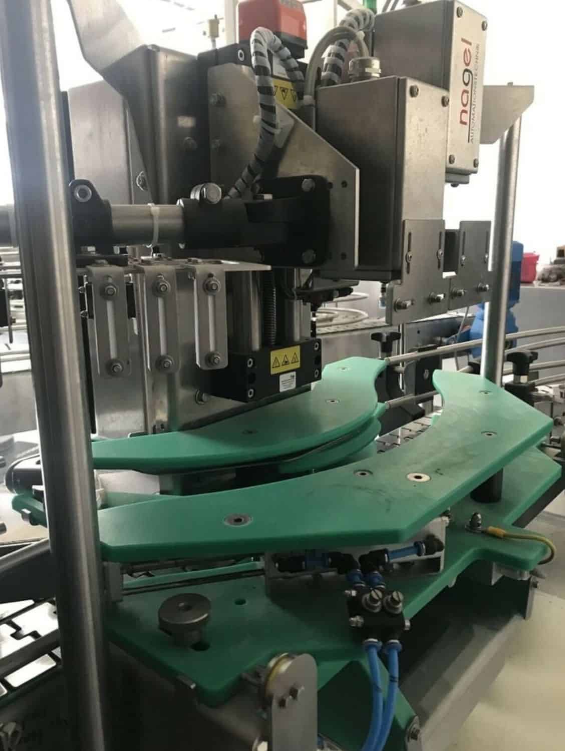 Side view of Nagel, PAC, Juwatec, ICS Returnable Glass Filling line for beer, soft drink