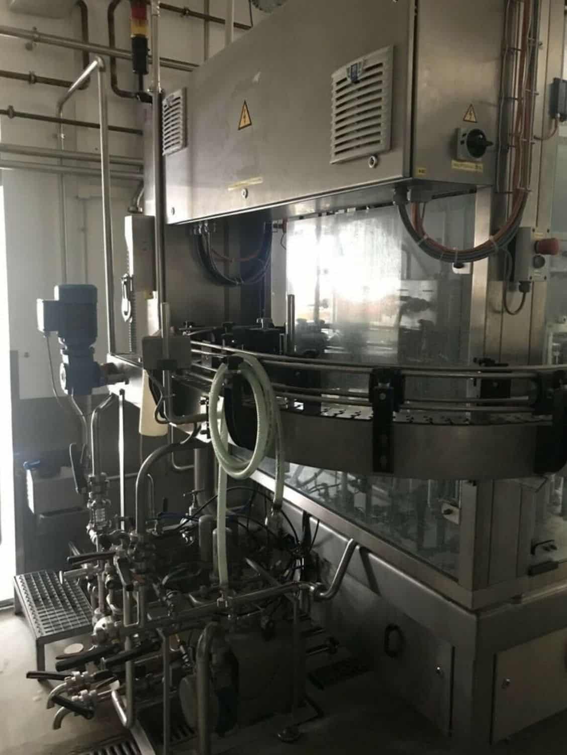 Left view of Nagel, PAC, Juwatec, ICS Returnable Glass Filling line for beer, soft drink