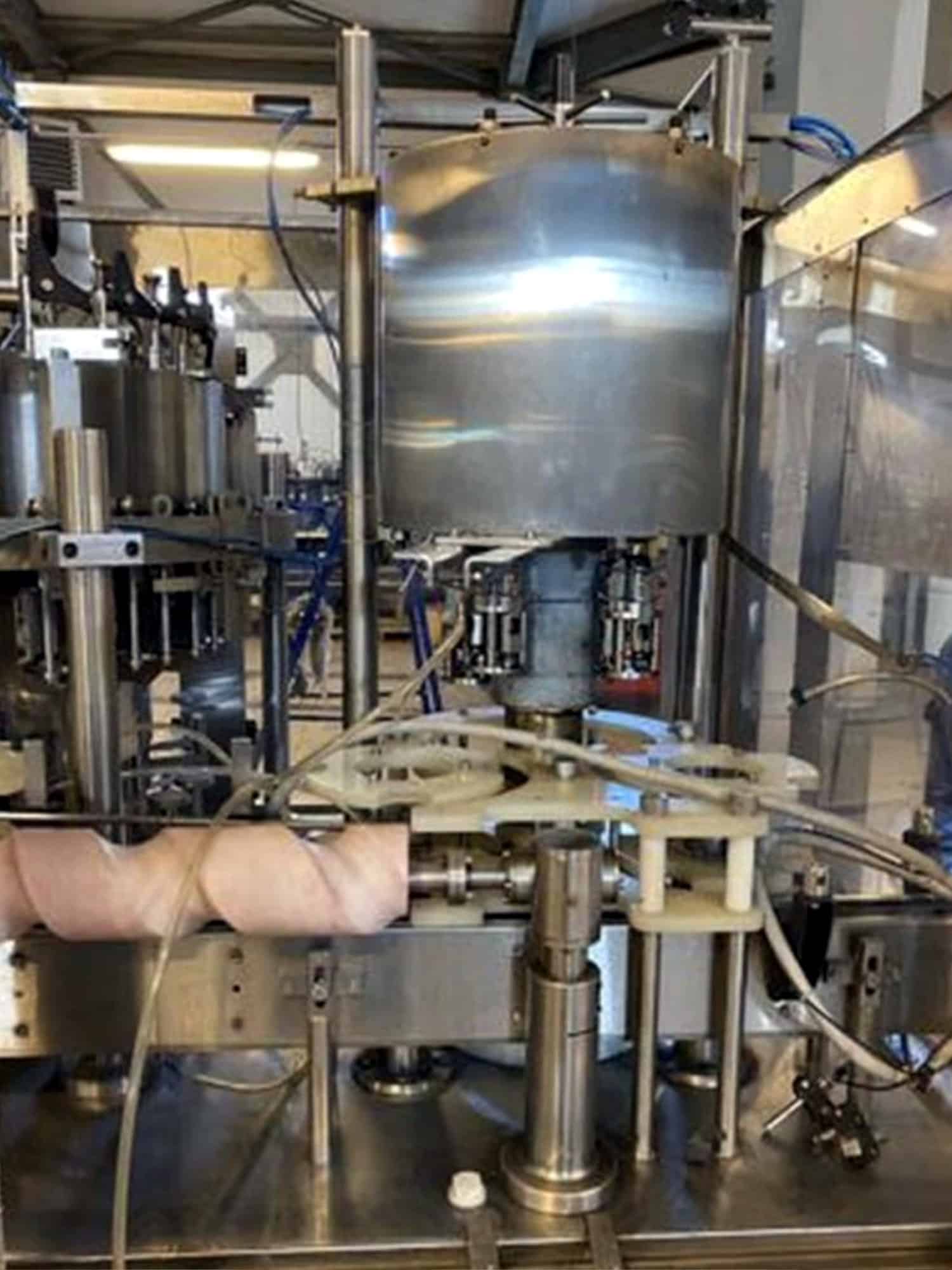Working room of Melegari TriBlock (rinser, filler, capper)